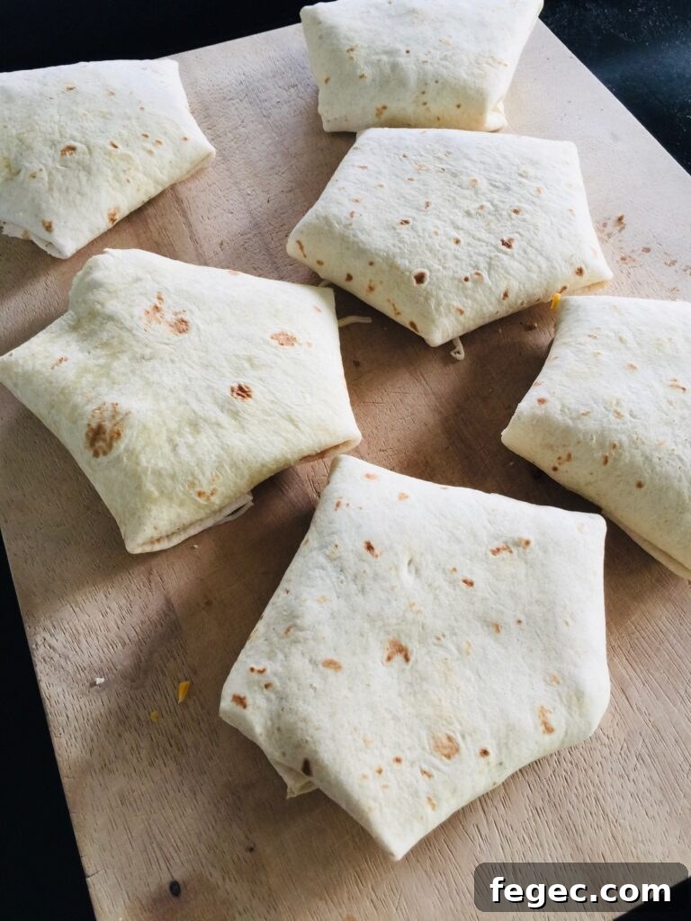 Blackstone Fritos Crunchwraps before cooking on the Blackstone