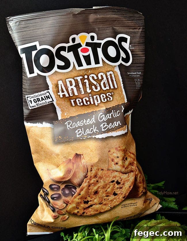 Tostitos Artisan Roasted Garlic Black Bean Tortilla chips for White Chili Bean Queso Dip recipe at Tidymom.net