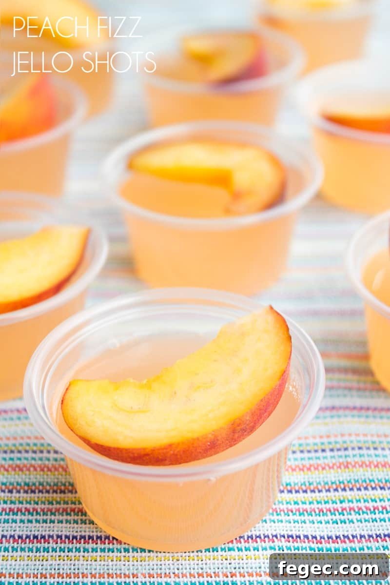Peach Fizz Jello Shots are about to become your go-to summer cocktail! Super easy to make and crazy good, these shots disappear in a flash!