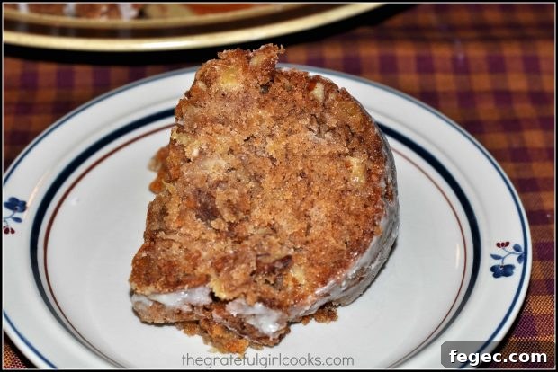One slice of hummingbird cake on a plate.