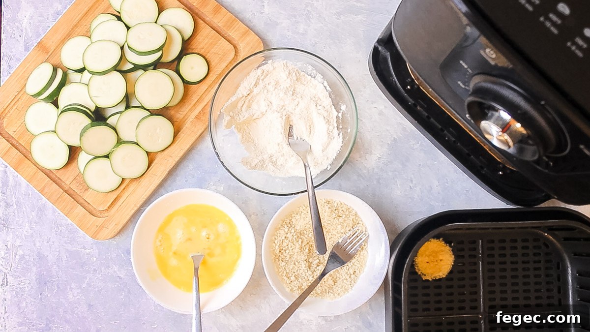 breading the air fryer zucchinis