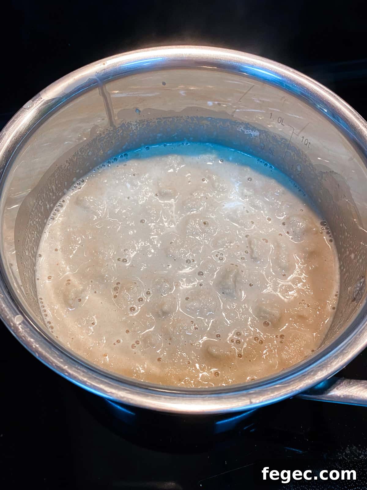 Photo of simmering bread sauce.