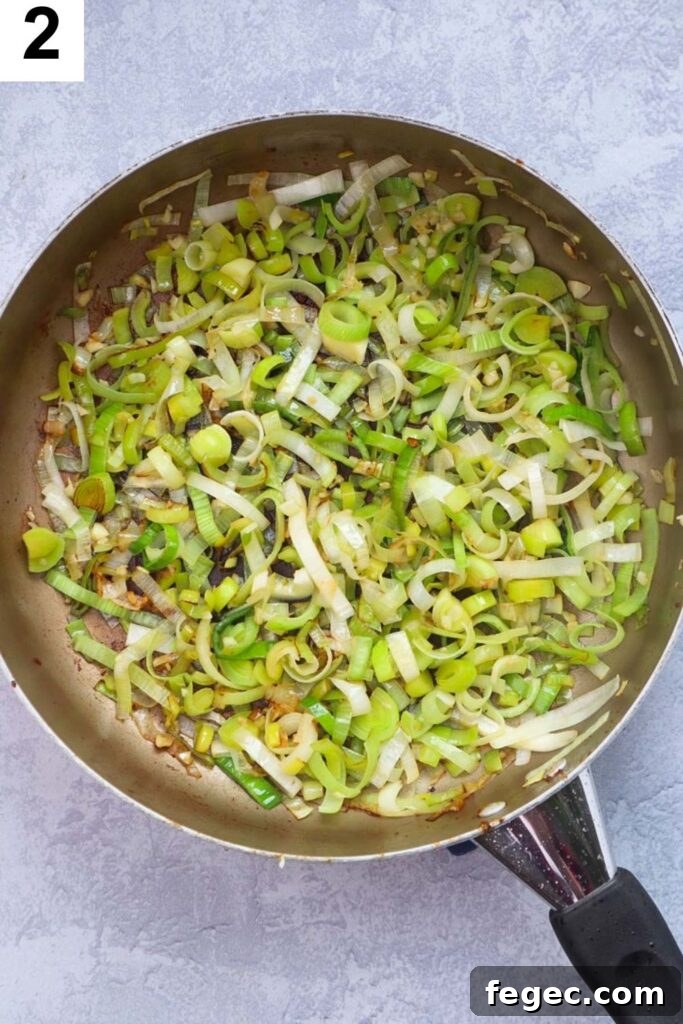 leeks sauteed in skillet with olive oil and garlic