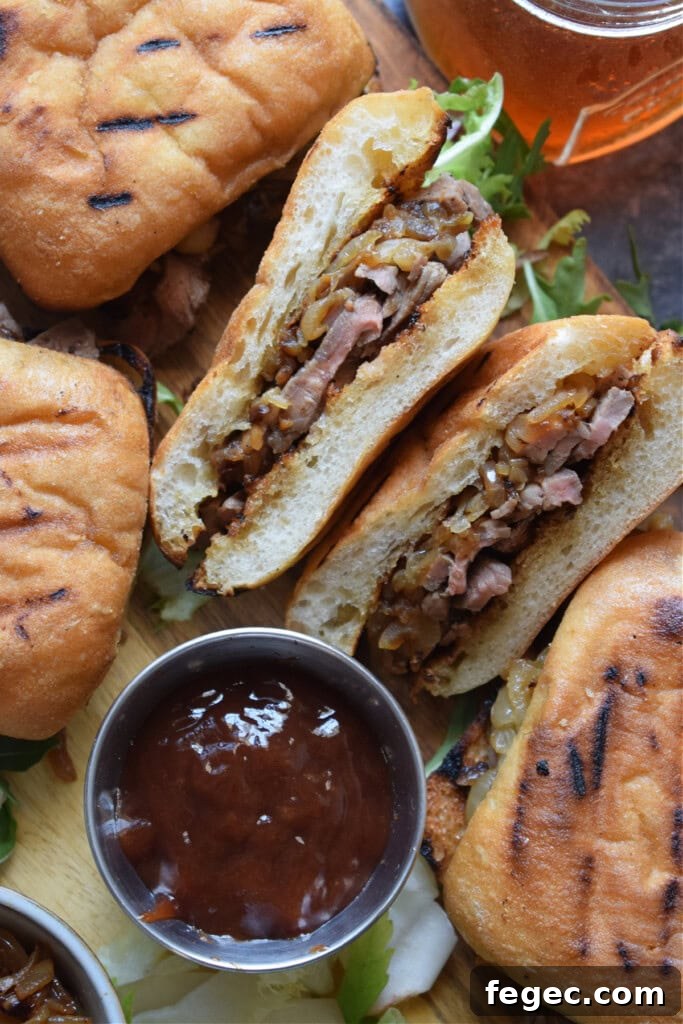 Shaved steak sandwiches with barbecue sauce.
