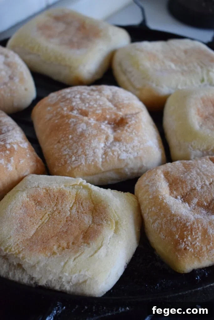 Heating bread in a skillet.