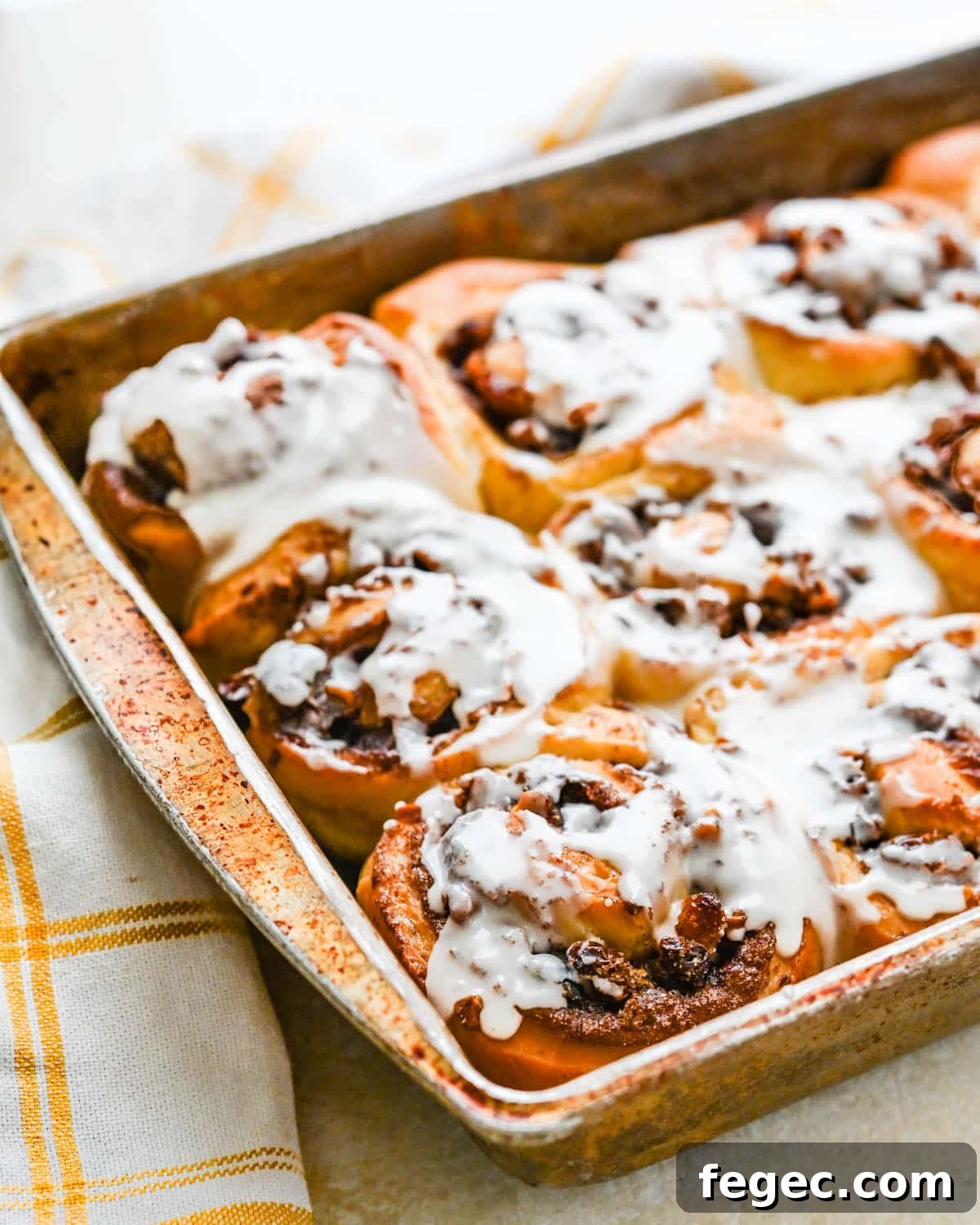 The iced sweet rolls recipe in a baking pan.