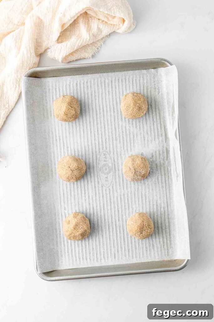 Cookie dough balls on a baking tray