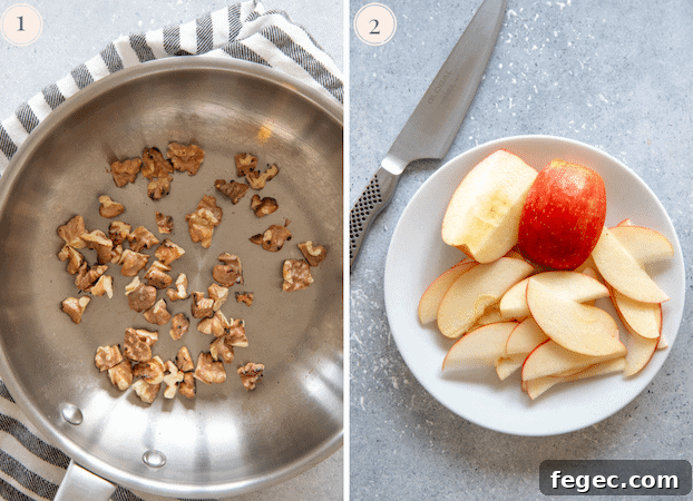 Toasted walnuts in an aluminium pan and sliced apple in a white plate