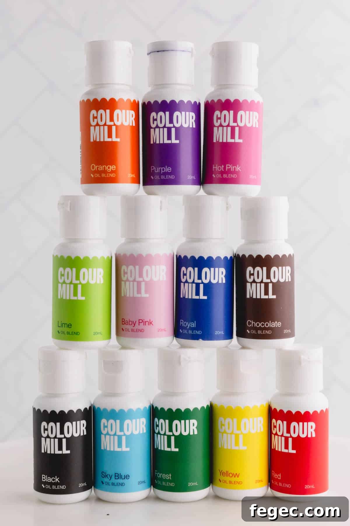 Food Coloring Guide: Uses, Tips, and Safety Essentials 6 12 colorful Color Mill brand gel food colorings stacked on of each other.