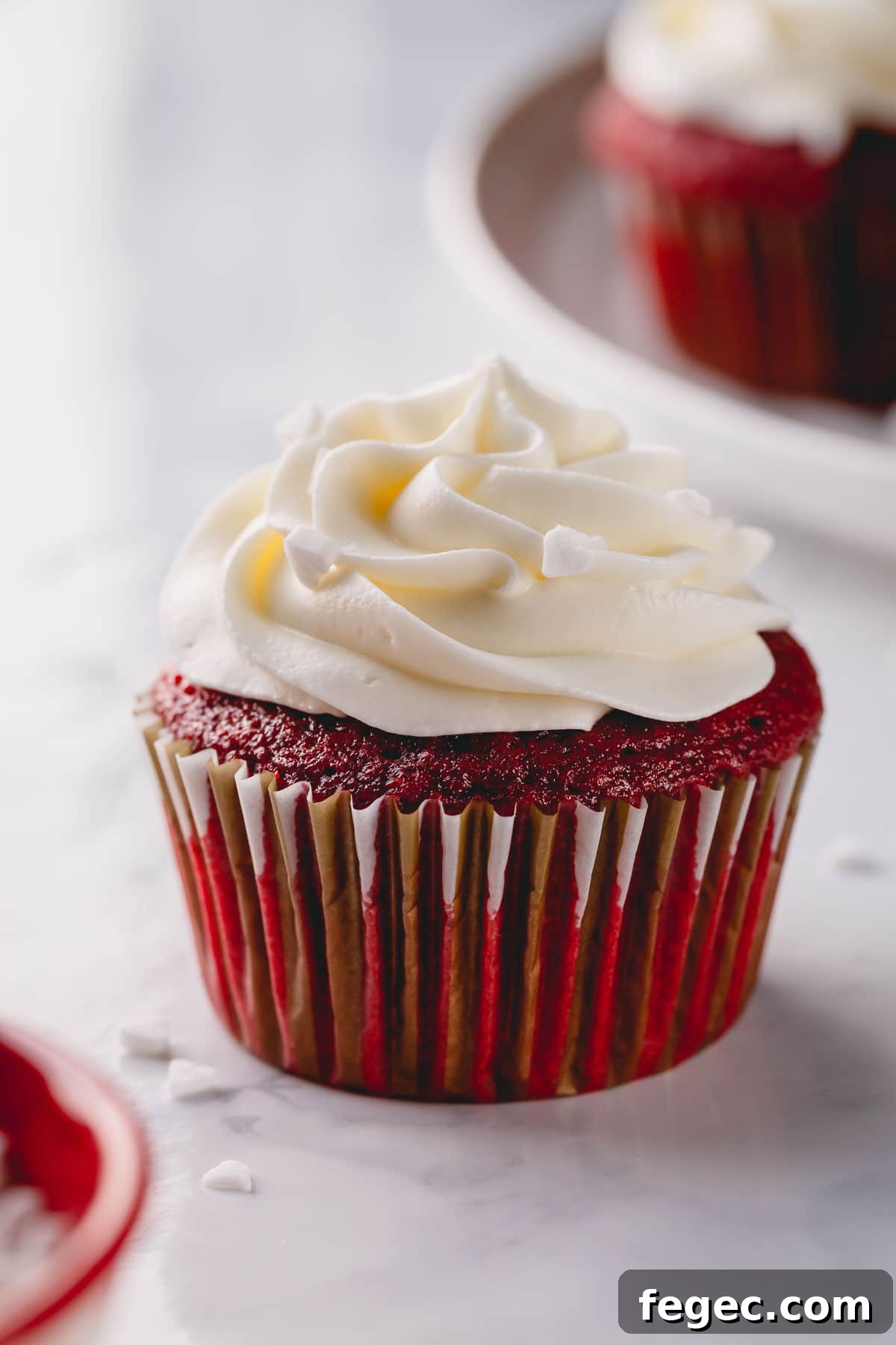 Food Coloring Guide: Uses, Tips, and Safety Essentials 7 Red velvet cupcake with white cream cheese frosting.