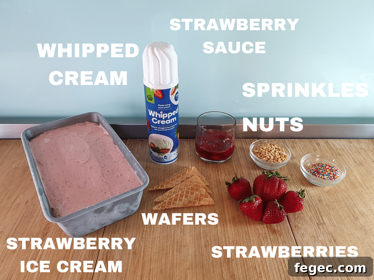 Strawberry sundae ingredients, strawberry ice cream, whipped cream, wafers, strawberry sauce, nuts, sprinkles, fresh strawberries.