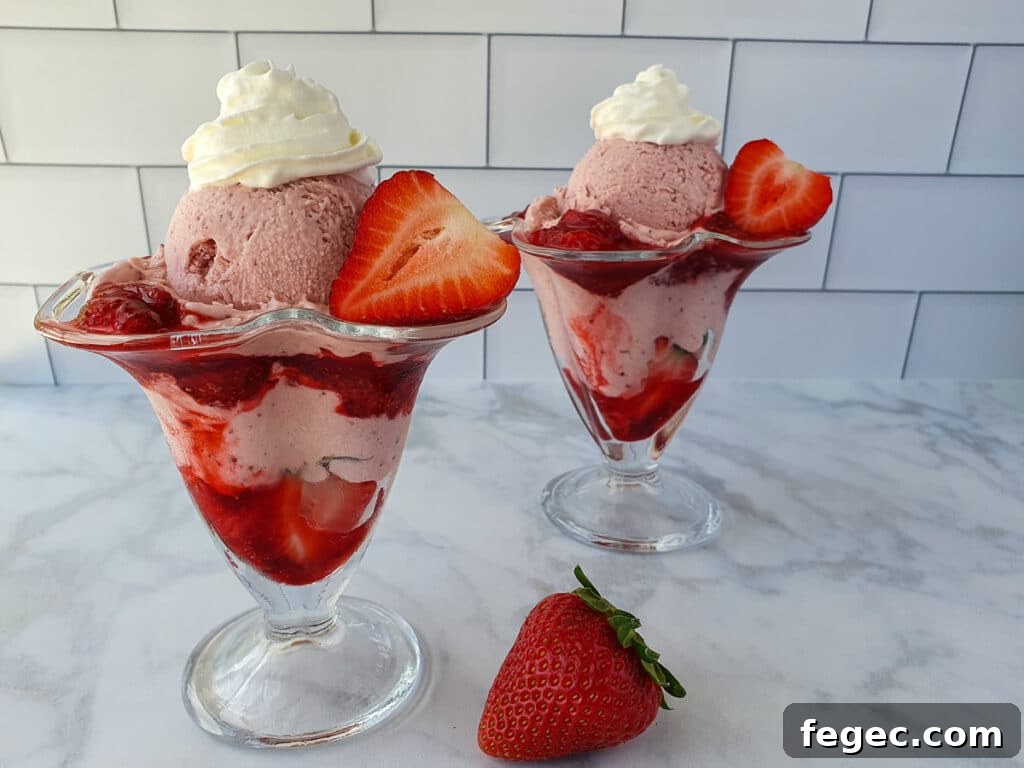 Adding fresh strawberries and whipped cream to the sundae