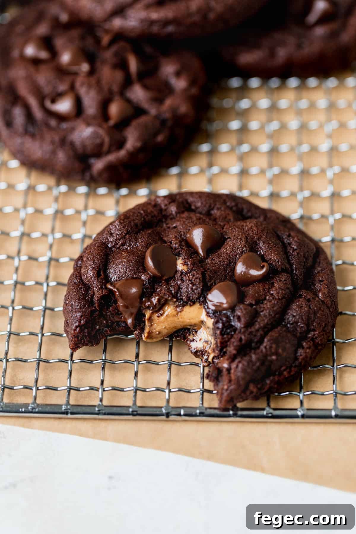 Bite missing from Chocolate peanut butter stuffed cookies.