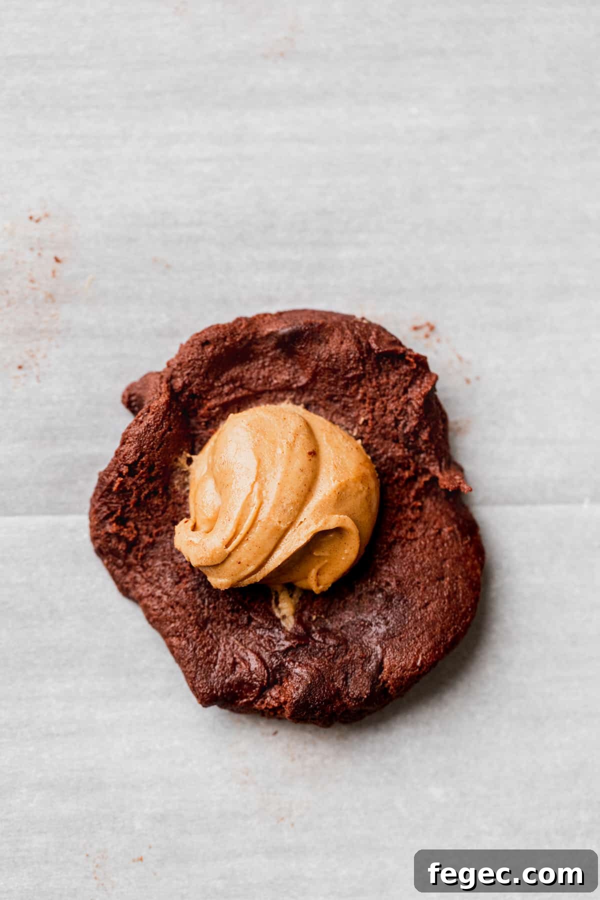 Peanut butter on top of cookie dough.