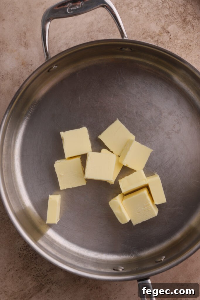 Chopped butter in a large saucepan.