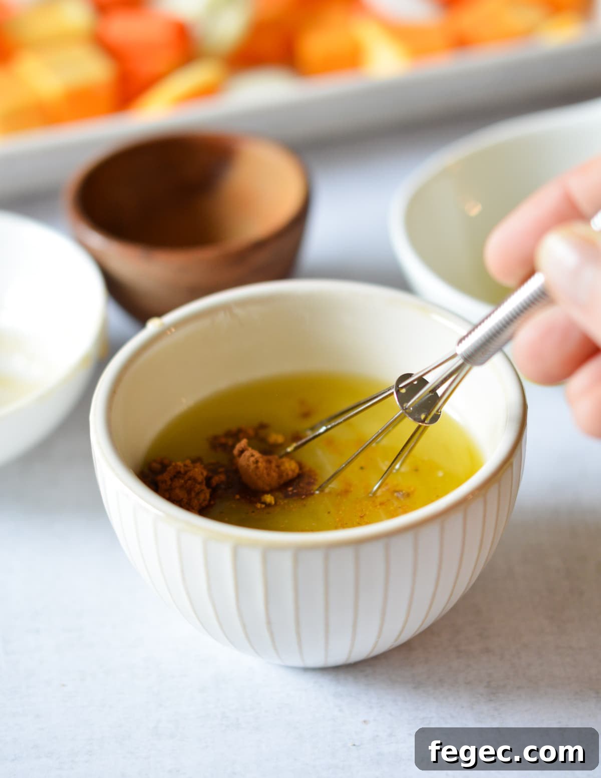 Creamy Roasted Butternut Squash Soup with Sage and Brown Butter 8 butter, oil, sugar, and spices in a small bowl with a small whisk.