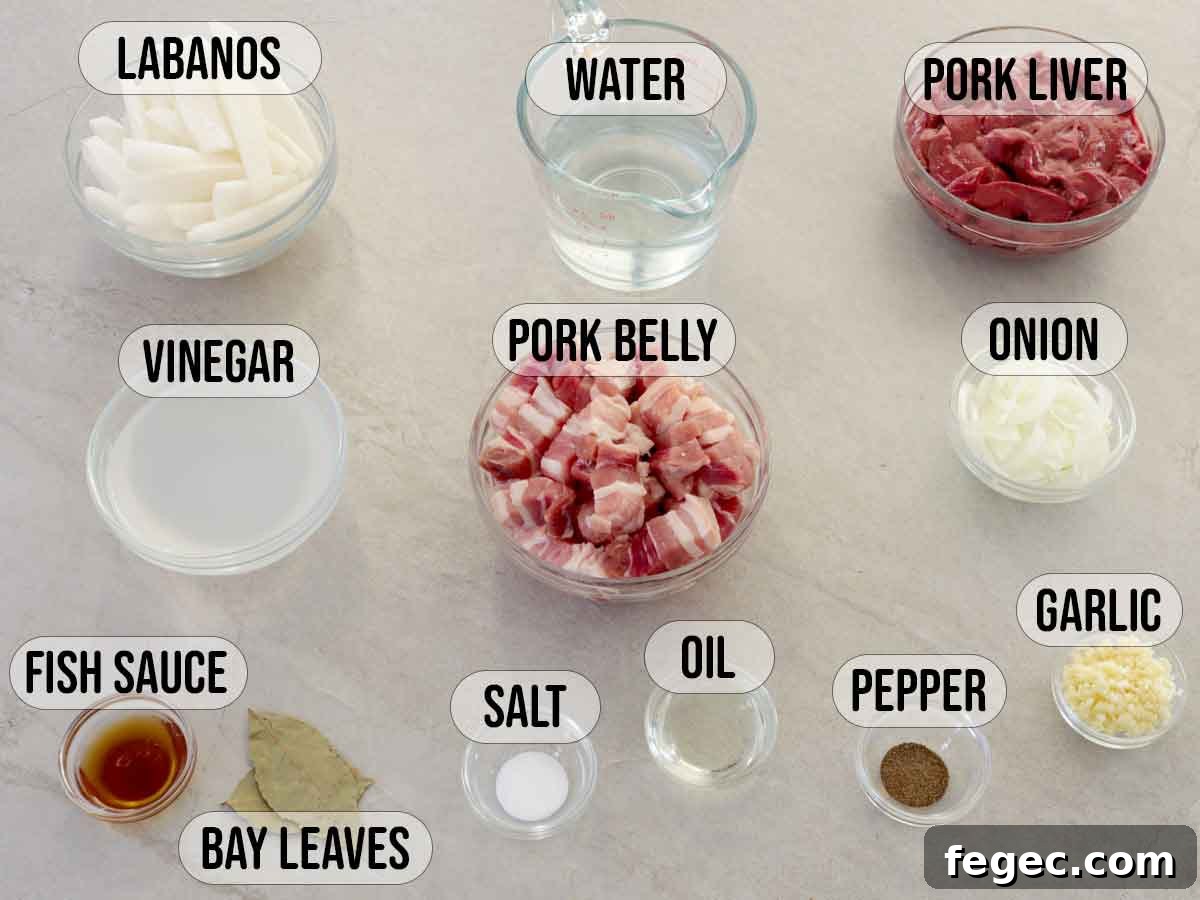 ingredients for Kilawing Labanos at Baboy in glass bowls.
