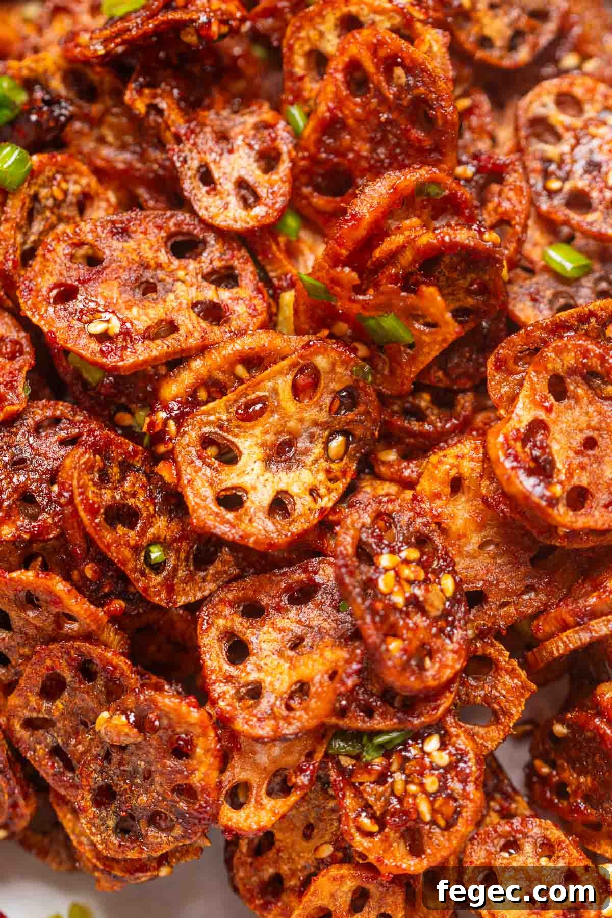 close up image of Korean crispy lotus stem to show it's thin and crispy texture