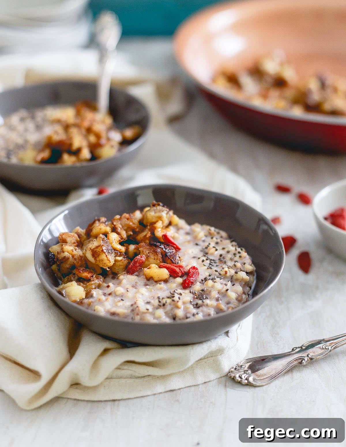 Top warm quinoa cereal (also easily made with buckwheat) with a caramelized banana topping and drizzle with some almond butter for a simple and delicious breakfast.