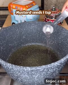 Mustard seeds and spices for Kerala style mango pickle.