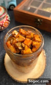 Delicious Kerala-style mango pickle with spicy, tangy flavors.