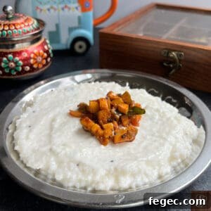 Authentic Kerala style mango pickle served with steamed rice.