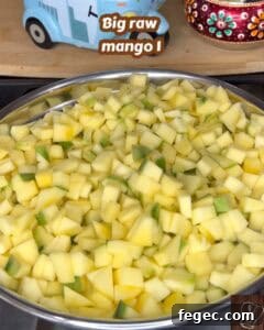 Freshly cut raw mango pieces for traditional Kerala style mango pickle.