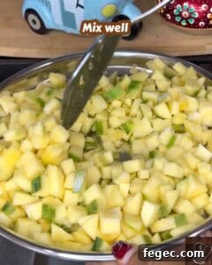 Authentic Kerala style mango pickle with fresh green mangoes and spices.