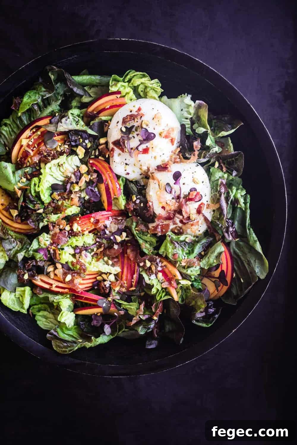 Stone Fruit & Crispy Prosciutto Salad with little gems and burrata alll ready to eat, overhead shot.