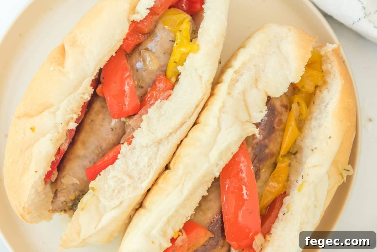 Sausage and peppers in hoagie buns.