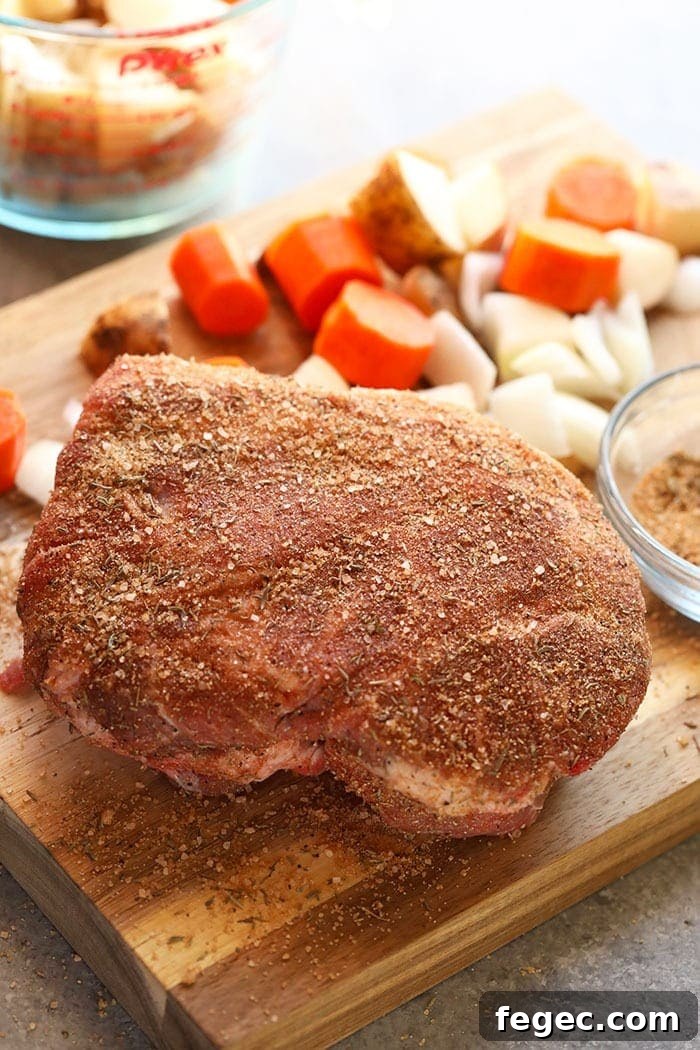 Dry rub on a pork shoulder roast