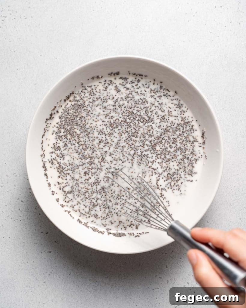 Whisking chia seeds with milk.