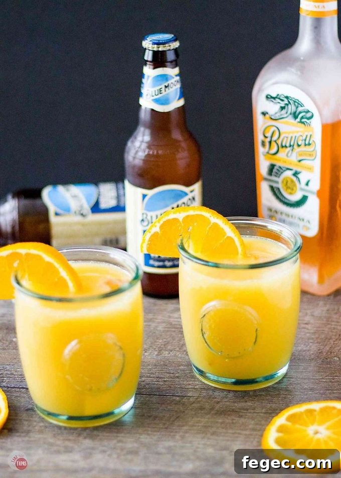 side view of orange shandy cocktail