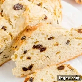 Sliced Irish soda bread with raisins.