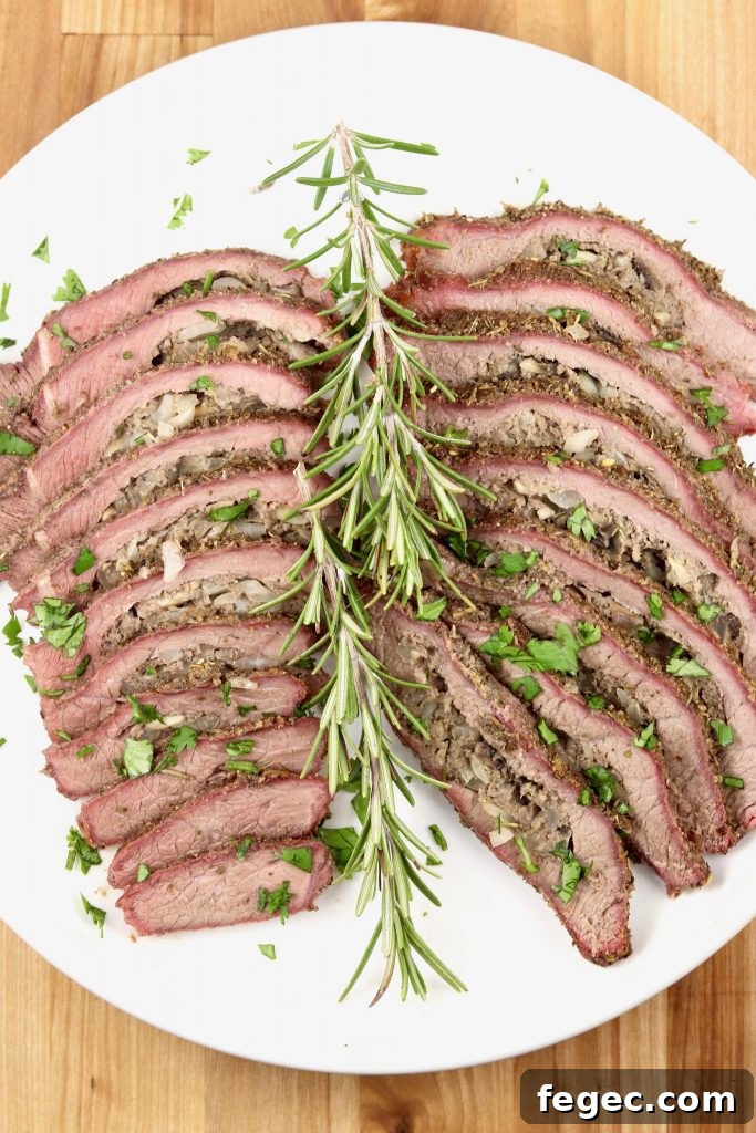 Sliced steak stuffed with mushrooms, onions and sausage.