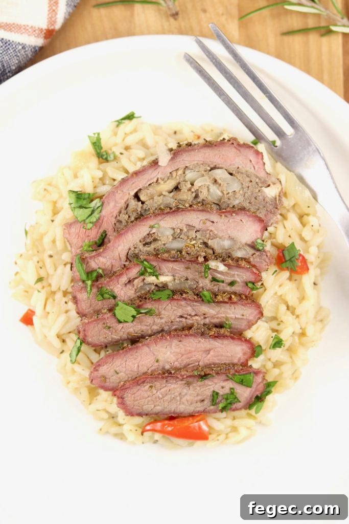 Sausage Stuffed Steak is easy, juicy and a great way to grill a less expensive cut of steak into something that is hard to beat.