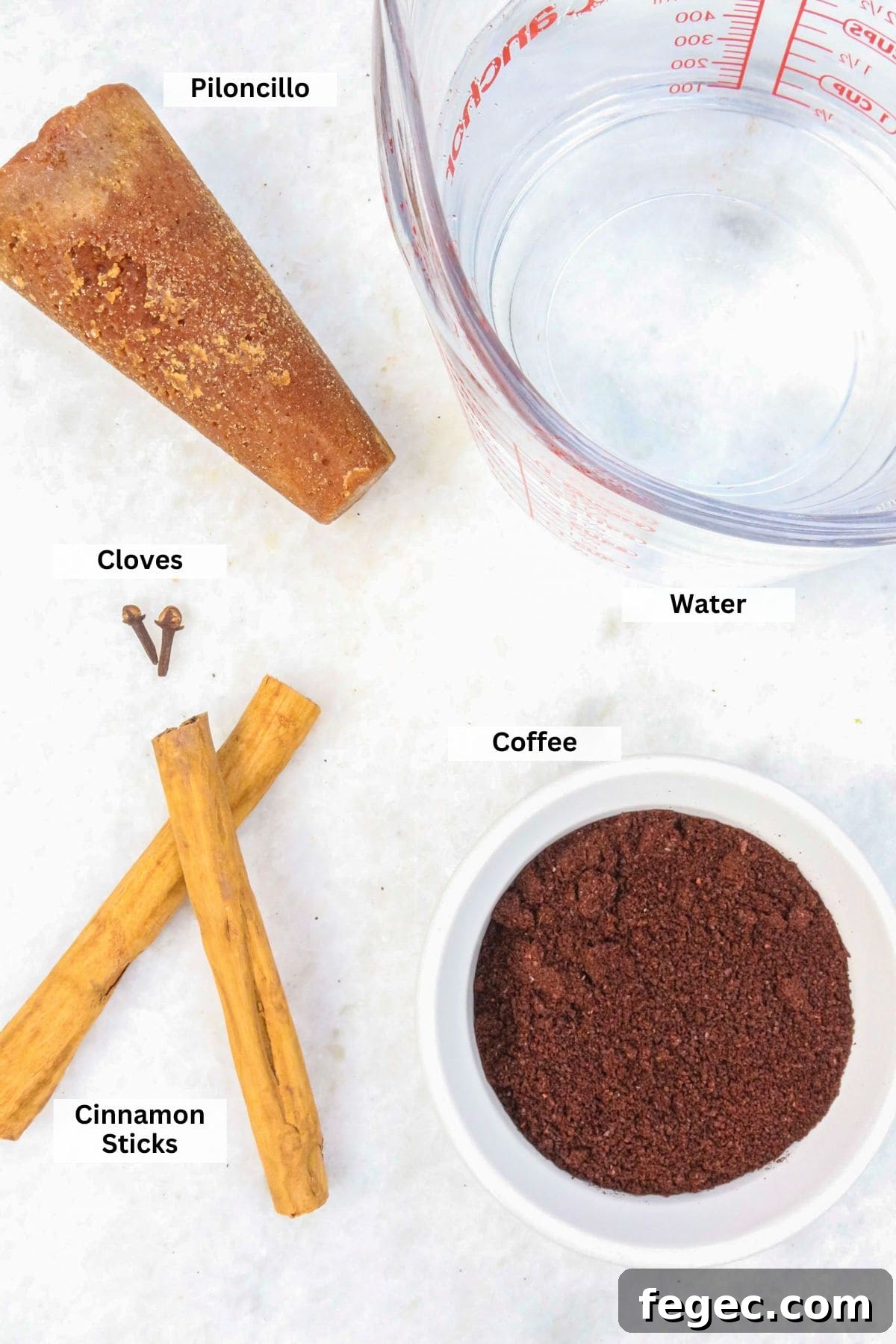 Authentic Mexican Café de Olla Recipe for Traditional Flavor 3 Ingredients for Cafe de Olla Recipe: piloncillo, water, coffee, cloves, cinnamon sticks