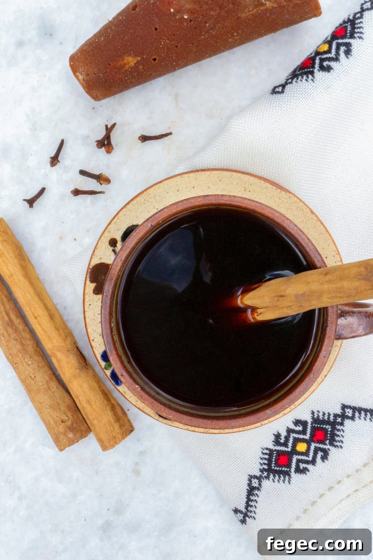 Authentic Mexican Café de Olla Recipe for Traditional Flavor 8 Authentic Cafe de Olla Recipe, bird's eye of a coffee in a mug with a cinnamon stick