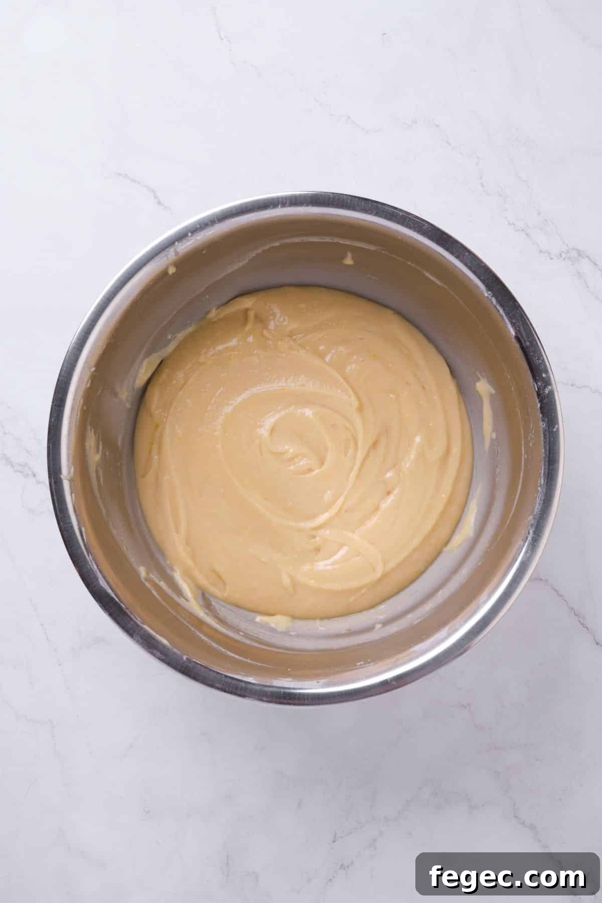 A bowl of lemon cake batter.