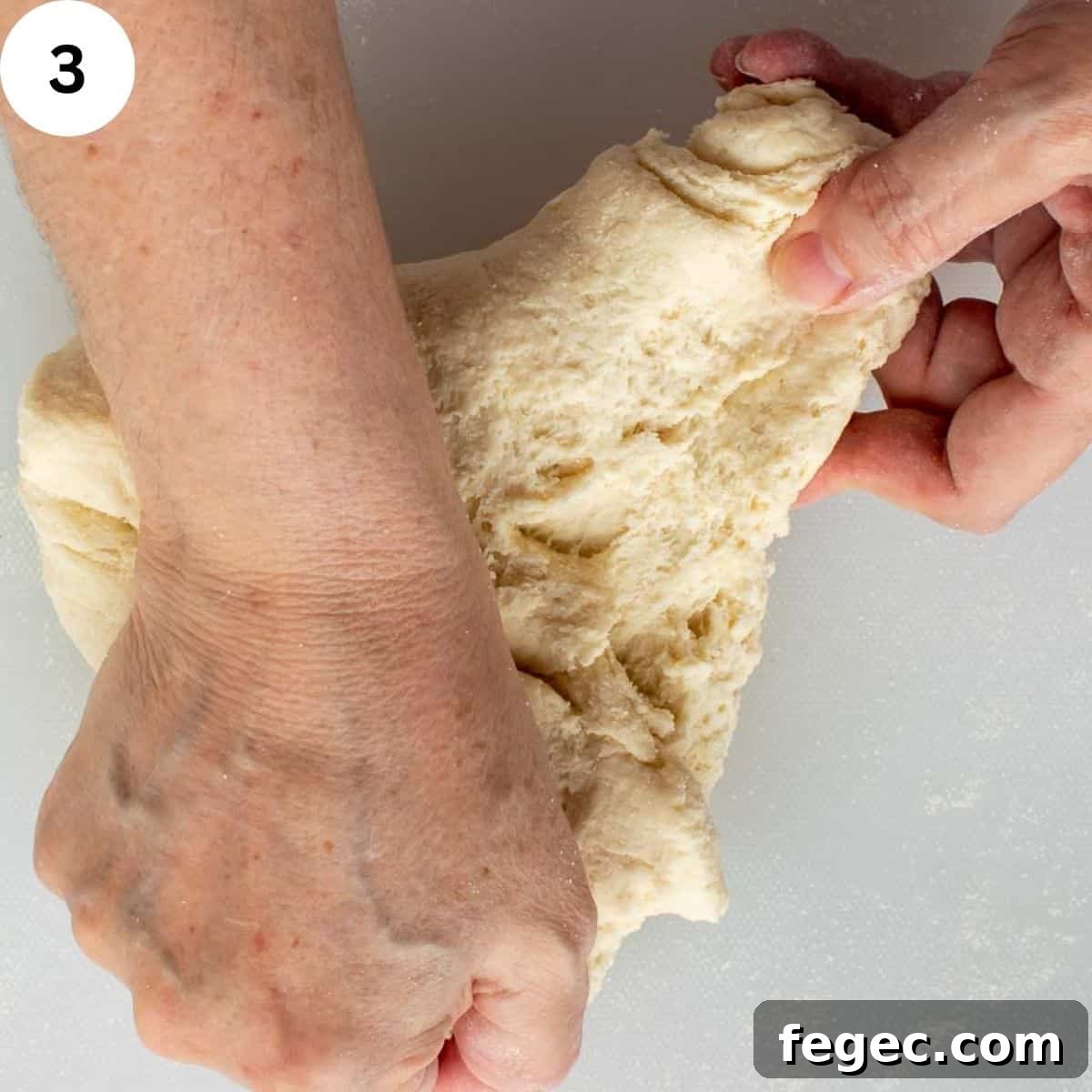 Kneading semolina pasta by hand.
