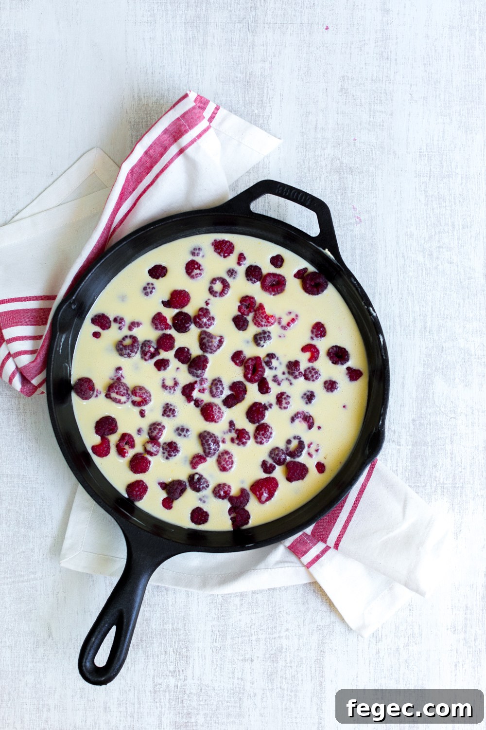 Pour the batter right over the berries in a cast iron skillet and bake. So easy. 