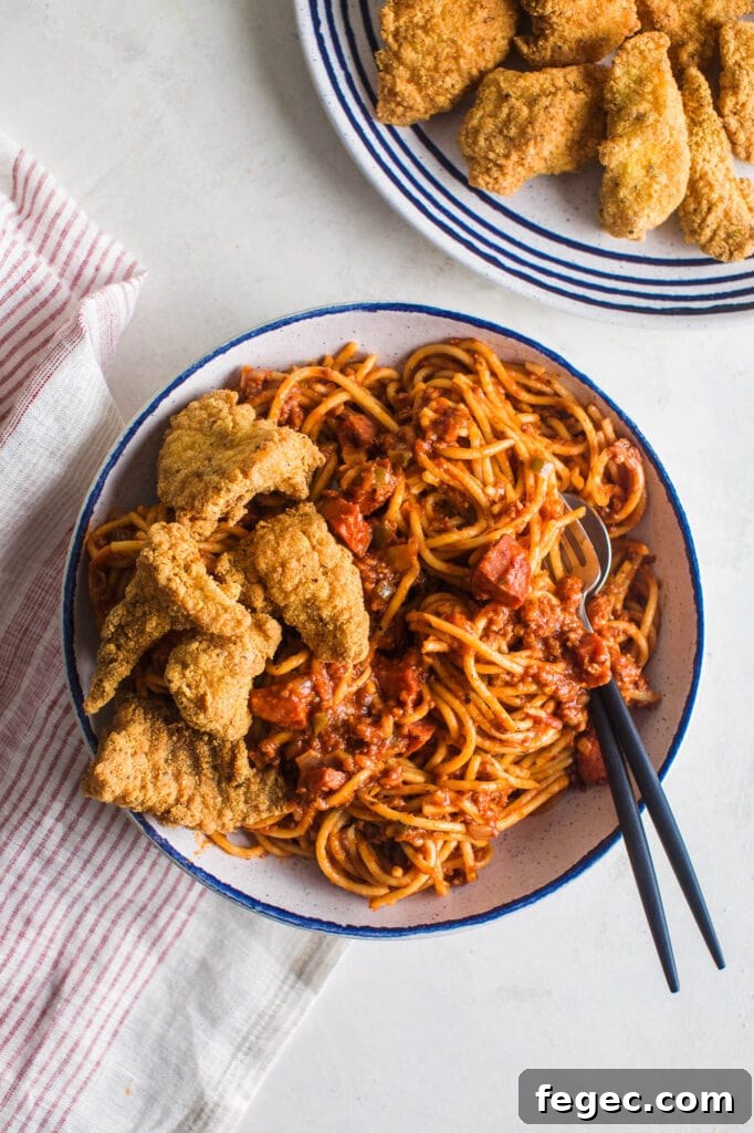 bowl of fish and spaghetti