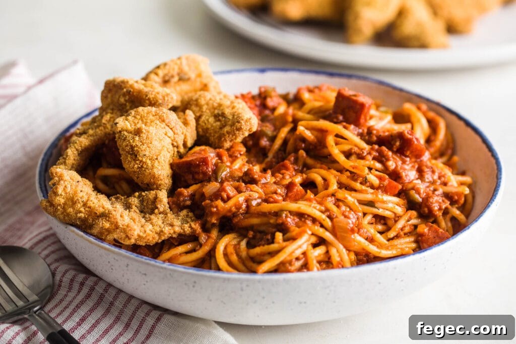 bowl of fried fish and soul food spaghetti