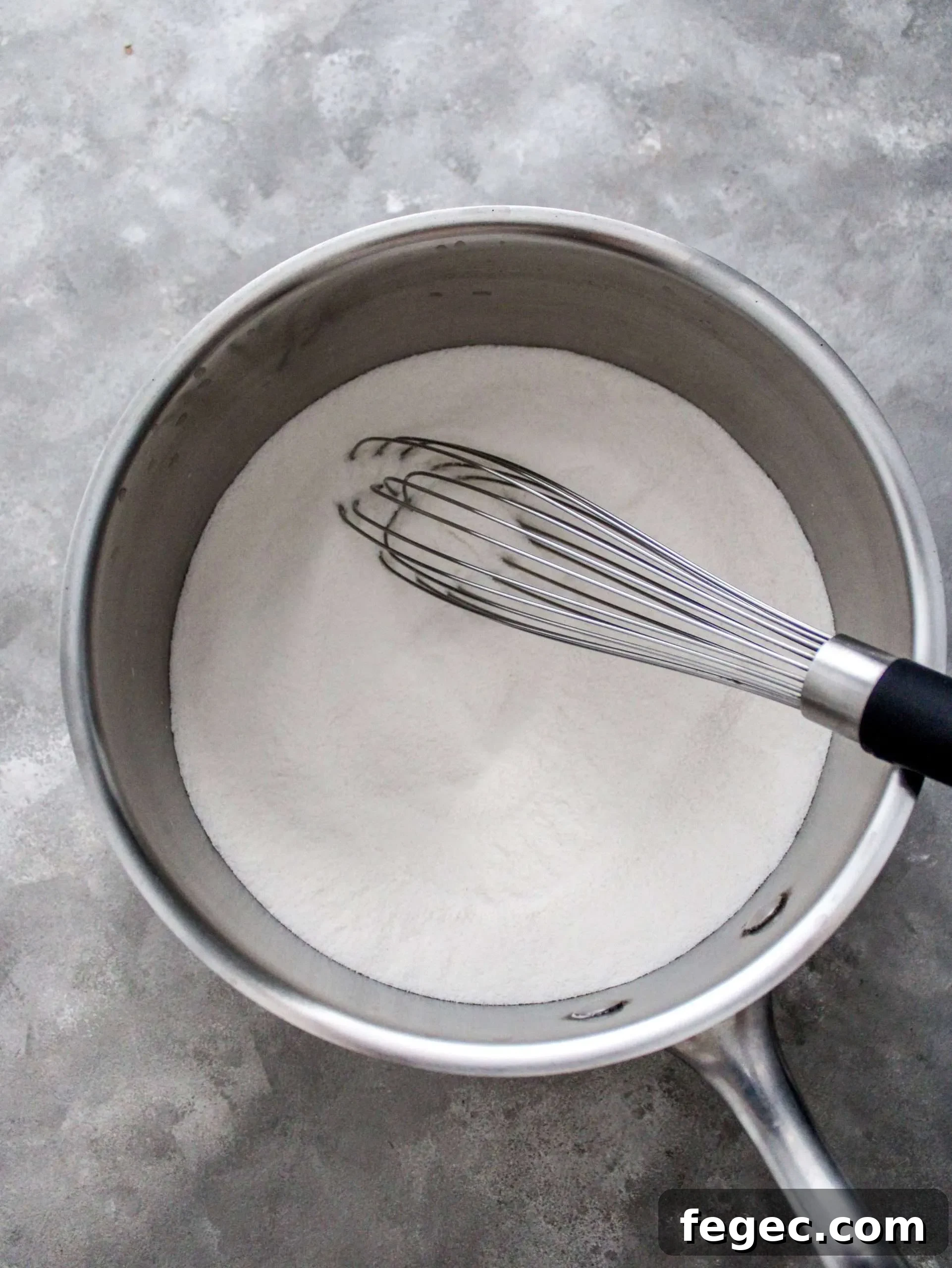 ermine frosting flour and sugar whisked together in pot