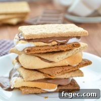 A stack of S'mores on a plate.