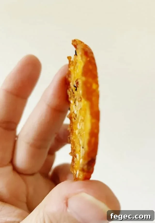 side view of everything seasoning cheese crisps