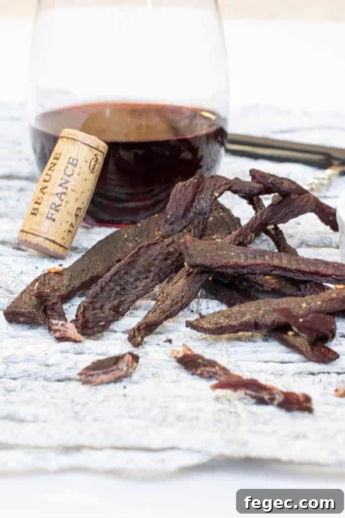 Deer jerky with wine and corkscrew