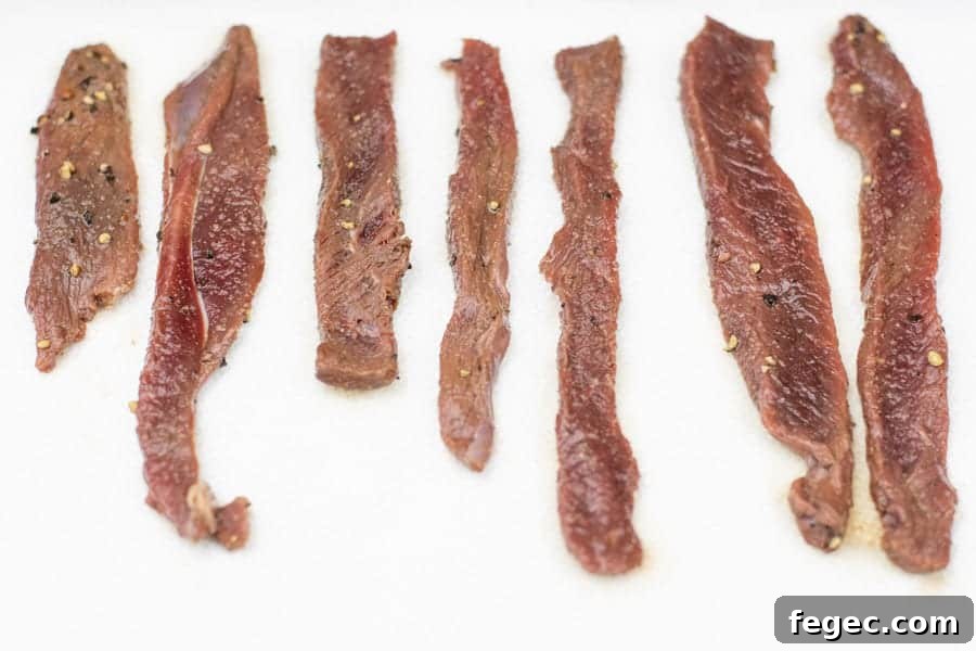 deer jerky strips pat dry on paper towels