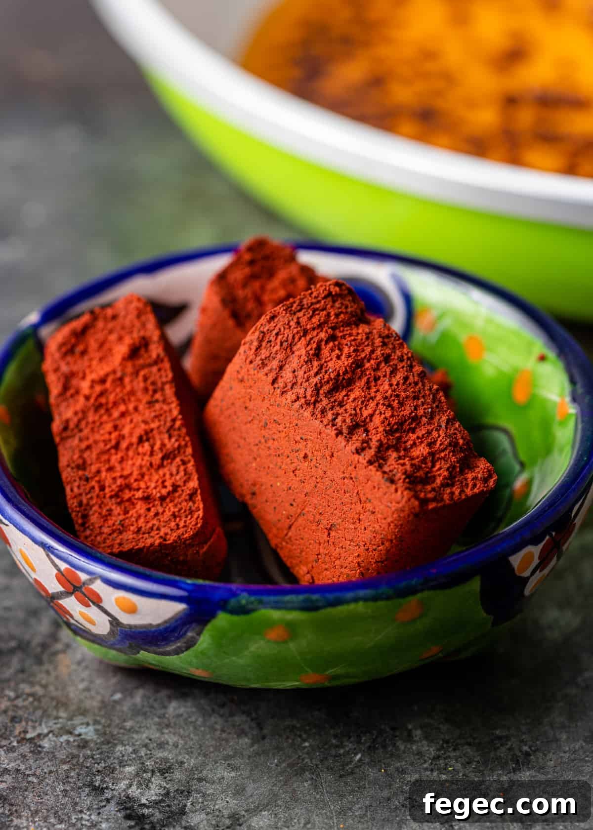 close up of achiote in small bowl