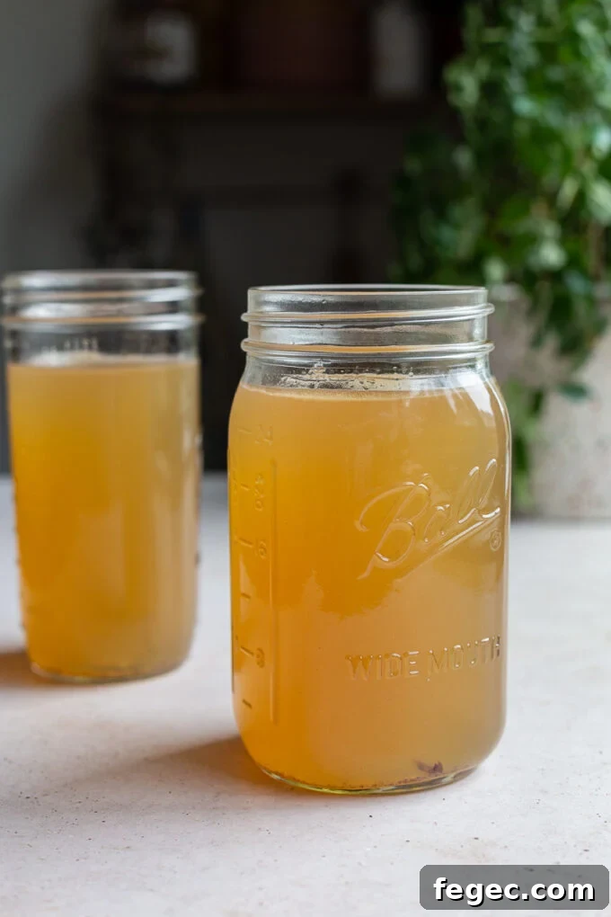 Two mason jars filled with bone broth